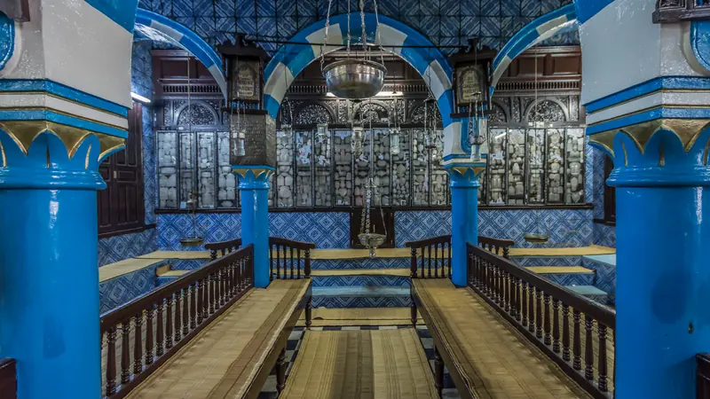 The blue columns and tilework of the El Ghriba synagogue on Djerba
